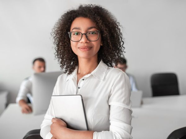 smiling-ethnic-female-recruiter-with-tablet-lookin-2022-12-01-18-10-48-utc-1536x1024